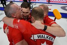 Team Canada skip Brad Gushue, second left,  celebrates defeating Team Manitoba with teammates EJ Harnden, left, Geoff Walker and Mark Nichols, right, in the finals of the 2023 Tim Hortons Brier in London, Ont., Sunday, March 12, 2023. THE CANADIAN PRESS/Frank Gunn