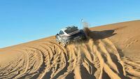 Driving up and down sand dunes in Morocco in the Porsche 911 Dakar, high-performance rally car that starts at more than $250,000.