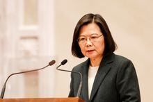 FILE PHOTO: Taiwan President Tsai Ing-wen speaks during a news conference with the incoming Taiwan Premier Chen Chien-jen and outgoing Taiwan Premier Su Tseng-chang at the presidential office in Taipei, Taiwan January 27, 2023. REUTERS/Carlos Garcia Rawlins/File Photo