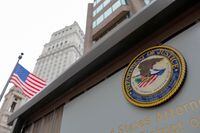 FILE PHOTO: The seal of the United States Department of Justice is seen on the building exterior of the United States Attorney's Office of the Southern District of New York in Manhattan, New York City, U.S., August 17, 2020. REUTERS/Andrew Kelly