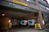 The emergency entrance to St. Michael's Hospital, in downtown Toronto, is photographed on Oct 21 2020. The hospital declared a COVID-19 outbreak among its emergency room staff.