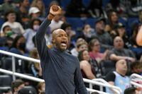 Orlando Magic head coach Jamahl Mosley directs his players against the Miami Heat during the first half of an NBA basketball game, Friday, Dec. 17, 2021, in Orlando, Fla. (AP Photo/John Raoux)

