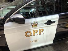 An Ontario Provincial Police vehicle sits idle in Toronto, Tuesday, April 11, 2023.&nbsp;Ontario Provincial Police are investigating a double homicide in Pembroke early Monday morning that left a third person with life-threatening injuries. THE&nbsp;CANADIAN PRESS/Tammy Hoy