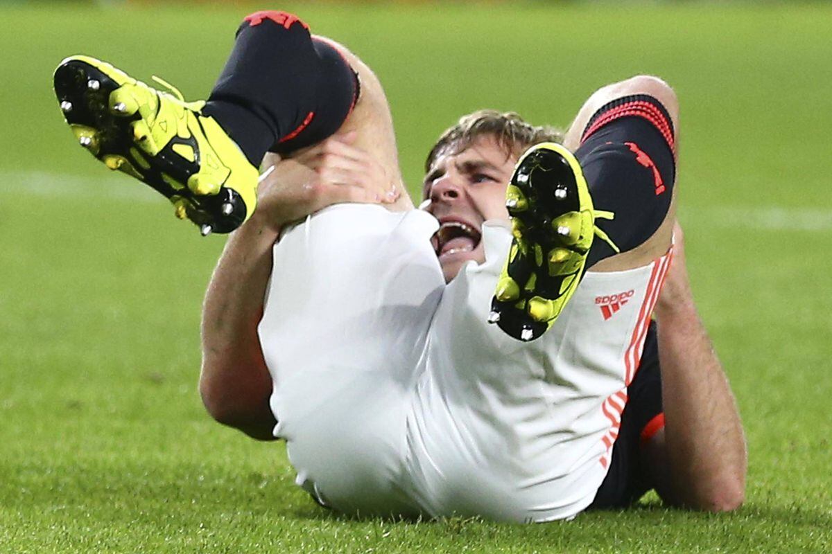 In Photos: Luke Shaw suffers serious leg injury - The Globe and Mail