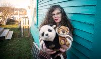 Ally Baird, in St John's, Newfoundland, with some of the World Wildlife Fund stuffed toys she has recived through donations to the WWF. Photo by Greg Locke