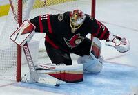 Ottawa Senators goaltender Anton Forsberg makes a save during first period NHL action against the Philadelphia Flyers, Friday, March 18, 2022 in Ottawa.  Forsberg made 28 saves as the Senators defeated the Flyers 3-1.THE CANADIAN PRESS/Adrian Wyld