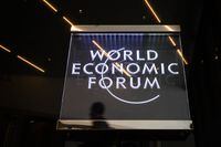 A man walks past a sign of the World Economic Forum (WEF) ahead of the WEF annual meeting at the Congress Centre on January 21, 2019 in Davos, eastern Switzerland. (Photo by Fabrice COFFRINI / AFP)FABRICE COFFRINI/AFP/Getty Images