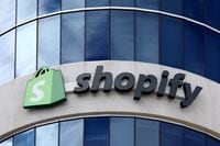 FILE PHOTO: The logo of Shopify is seen outside its headquarters in Ottawa, Ontario, Canada, Sept. 28, 2018. REUTERS/Chris Wattie/File Photo
