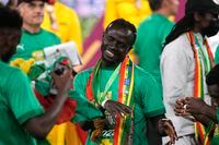 Senegal's Sadio Mane dances as they celebrate after winning the African Cup of Nations 2022 final soccer match against Egypt at the Olembe stadium in Yaounde, Cameroon, Sunday, Feb. 6, 2022. (AP Photo/Themba Hadebe)