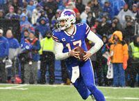 Dec 11, 2022; Orchard Park, New York, USA; Buffalo Bills quarterback Josh Allen (17) rolls out of the pocket in the fourth quarter game against the New York Jets at Highmark Stadium. Mandatory Credit: Mark Konezny-USA TODAY Sports