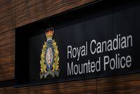 The RCMP logo is seen outside the force's 'E' division headquarters in Surrey, B.C., on Thursday, March 16, 2023.&nbsp;RCMP say five people have died in a two-vehicle collision in northern Alberta. THE CANADIAN PRESS/Darryl Dyck