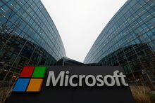 FILE PHOTO: A view shows a Microsoft logo at Microsoft France headquarters in Issy-les-Moulineaux near Paris, France, January 25, 2023. REUTERS/Gonzalo Fuentes