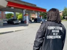 A Competition Bureau officer visits a gas station in Canada.