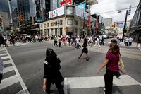 Toronto July 03/09 - Pedestrians and shoppers walk along on Yonge Street in Toronto, Ontario, Canada. Photo by Deborah Baic The Globe and Mail