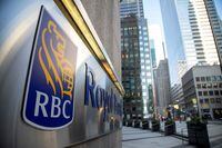 FILE PHOTO: A sign for the Royal Bank of Canada in Toronto, Ontario, Canada December 13, 2021.  REUTERS/Carlos Osorio/File Photo