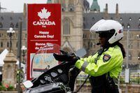 A police presence has increased around Parliament Hill ahead of Canada Day celebration activities and anti-mandate protests in Ottawa, Ontario, Canada June 29, 2022. REUTERS/Blair Gable