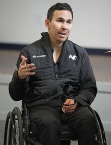 Robert Wickens answers questions during an interview prior to the Rolex 24 hour auto race at Daytona International Speedway, Thursday, Jan. 26, 2023, in Daytona Beach, Fla. Bryan Herta wants to enter Wickens in the Indianapolis 500 as early as 2024. That's even a year longer than preferred because of the work required on the hand control system needed for the paralyzed driver. (AP Photo/John Raoux)