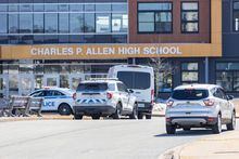 Police monitor the situation at Charles P. Allen High School in Halifax, Monday, March 20, 2023.The Halifax-area school where two staff members were stabbed earlier this week is expected to resume classes this afternoon.&nbsp;THE CANADIAN PRESS/Riley Smith