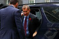 FILE PHOTO: British Chancellor of the Exchequer Jeremy Hunt exits a car outside Number 10 Downing Street, in London, Britain November 1, 2022. REUTERS/Hannah McKay