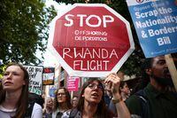 Protestors demonstrate outside the Home Office against the British Governments plans to deport asylum seekers to Rwanda, in London, Britain, June 13, 2022. REUTERS/Henry Nicholls