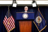 FILE PHOTO: Federal Reserve Chair Jerome Powell holds a news conference following the Federal Open Market Committee meeting in Washington, U.S., December 11, 2019. REUTERS/Joshua Roberts/File Photo