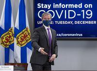 Nova Scotia Premier Tim Houston gestures as he heads from a COVID-19 briefing in Halifax on Tuesday, Dec. 7, 2021. THE CANADIAN PRESS/Andrew Vaughan