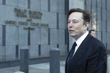 Elon Musk departs the Phillip Burton Federal Building and United States Court House in San Francisco, on Tuesday, Jan. 24, 2023. (AP Photo/ Benjamin Fanjoy)