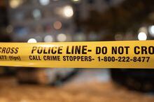 Police tape is shown in Toronto on Jan 14, 2023. Toronto police say a person has died after a shooting at a residential area in the city's northwest end. THE CANADIAN PRESS/Arlyn McAdorey