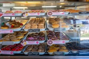 Doughnuts are displayed for sale at a Krispy Kreme store on February 13, 2024 in Austin, Texas.