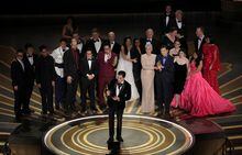 FILE PHOTO: Daniel Kwan, Daniel Scheinert and Jonathan Wang win the Oscar for Best Picture for "Everything Everywhere All at Once" during the Oscars show at the 95th Academy Awards in Hollywood, Los Angeles, California, U.S., March 12, 2023. REUTERS/Carlos Barria/File Photo