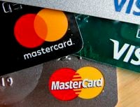 Mastercard and Visa credit cards are shown in Zelienople, Pa., on Feb. 20, 2019. THE CANADIAN PRESS/AP, Keith Srakocic