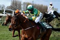 Rachael Blackmore ridding Minella Times races to win the Randox Grand National Handicap Chase on the third day of the Grand National Horse Racing meeting at Aintree racecourse, near Liverpool, England, Saturday April 10, 2021. (Peter Powell/Pool via AP)