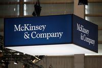 FILE PHOTO: The logo of consulting firm McKinsey and Company is seen at the high profile startups and high tech leaders gathering, Viva Tech,in Paris, France May 16, 2019. REUTERS/Charles Platiau/File Photo
