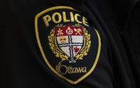 A close-up of an Ottawa Police officer’s badge is seen on Thursday, April 28, 2022 in Ottawa. A four-decade-old missing persons case has been resolved more than a year after the woman's family made a renewed plea for information.THE CANADIAN PRESS/Adrian Wyld
