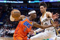 Mar 11, 2023; New Orleans, Louisiana, USA; Oklahoma City Thunder guard Shai Gilgeous-Alexander (2) dribbles against New Orleans Pelicans center Jaxson Hayes (10)  during the first half at Smoothie King Center. Mandatory Credit: Stephen Lew-USA TODAY Sports
