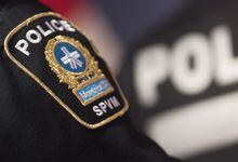 Quebec's police ethics board says two Montreal police officers lied to investigators looking into the in-custody death of a 23-year-old man. A Montreal Police badge is shown during a news conference in Montreal, Monday, Oct. 7, 2019. THE CANADIAN PRESS/Graham Hughes