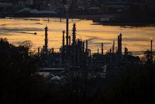 Parkland Fuel Corp. said Thursday its Burnaby, B.C. refinery is not for sale, even in the face of pressure from an activist investor. A boat travels past the Parkland Burnaby Refinery on Burrard Inlet at sunset in Burnaby, B.C., on Saturday, April 17, 2021. THE CANADIAN PRESS/Darryl Dyck