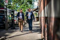 Ontario Proud founder Jeff Ballingall, right, walks with director Ryan O'Connor in Toronto.