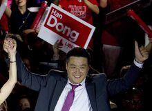Provincial Liberal candidate Han Dong celebrates with supporters while taking part in a rally in Toronto on Thursday, May 22, 2014. Han Dong, the member of Parliament at the centre of allegations of Chinese meddling in the 2019 federal election, says he is resigning from the Liberal caucus and will sit as an Independent. THE CANADIAN PRESS/Nathan Denette