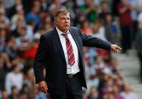 FILE - West Ham United's manager Sam Allardyce reacts as he watches his team play against Cardiff City during their English Premier League soccer match at Upton Park, London, Saturday, Aug. 17, 2013. Sam Allardyce has made an unlikely return to Premier League management. The 68-year-old former England coach has been hired by Leeds until the end of the season after the relegation-threatened club fired Javi Gracia. (AP Photo/Sang Tan, File)