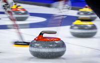 Quebec and Northwest Territories won their morning draw matches at the Canadian mixed curling championships in Prince Albert, Sask., setting up a clash for top spot in the final championship pool draw on Friday night. Players sweep a rock at the Tim Hortons Brier in Lethbridge, Alta., on March 6, 2022. THE CANADIAN PRESS/Jeff McIntosh