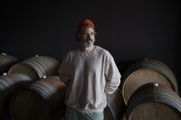 Jean-Benoit Deslauriers, head winemaker at Benjamin Bridge Vineyards, poses in the barrel room at the vineyard in Wolfville, N.S. on Tuesday, August 2, 2022.Darren Calabrese/The Globe and Mail