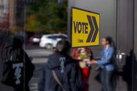 Voters line up outside a voting station to cast their ballot in the Toronto's municipal election in Toronto on Monday, October 22 , 2018. If the past 40 years of municipal elections are any indication, a vast majority of local councils in Ontario will be elected by less than half of eligible voters on Oct. 24.THE CANADIAN PRESS/Chris Young