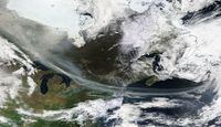 A trail of smoke from wildfires burning in Alberta and B.C. is seen spreading across Ontario and the northeastern United States in a Tuesday, May 9, 2023, satellite handout image. THE CANADIAN PRESS/HO-NASA Worldview **MANDATORY CREDIT**