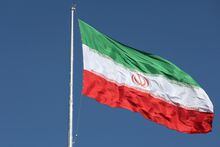 FILE PHOTO: The Iranian flag is seen flying over a street in Tehran, Iran, February 3, 2023. Majid Asgaripour/WANA (West Asia News Agency) via REUTERS