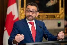 Minister of Transport Omar Alghabra speaks with members of the media after tabling legislation in the House of Commons, Thursday, Nov. 17, 2022 in Ottawa. THE CANADIAN PRESS/Adrian Wyld