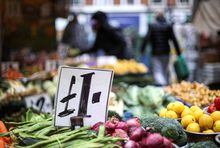 FILE PHOTO: A price tag is pictured at Lewisham Market amid the outbreak of the coronavirus disease (COVID-19) in London, Britain October 13, 2020. REUTERS/Hannah McKay/File Photo