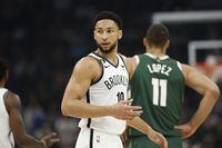 MILWAUKEE, WISCONSIN - OCTOBER 26: Ben Simmons #10 of the Brooklyn Nets reacts after being called for a technical foul during the first half of the game against the Brooklyn Nets at Fiserv Forum on October 26, 2022 in Milwaukee, Wisconsin. NOTE TO USER: User expressly acknowledges and agrees that, by downloading and or using this photograph, User is consenting to the terms and conditions of the Getty Images License Agreement. (Photo by John Fisher/Getty Images)