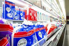 Milk and dairy products are displayed for sale at a grocery store in Aylmer, Que., on Thursday, May 26, 2022. New figures show grocery inflation in Canada surged again in November as the price of basics like bread, eggs and dairy products shot up. THE CANADIAN PRESS/Sean Kilpatrick