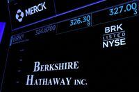 Trading information and logo for Berkshire Hathaway is displayed on a screen on the floor of the New York Stock Exchange (NYSE) in New York City, U.S., May 10, 2023.  REUTERS/Brendan McDermid